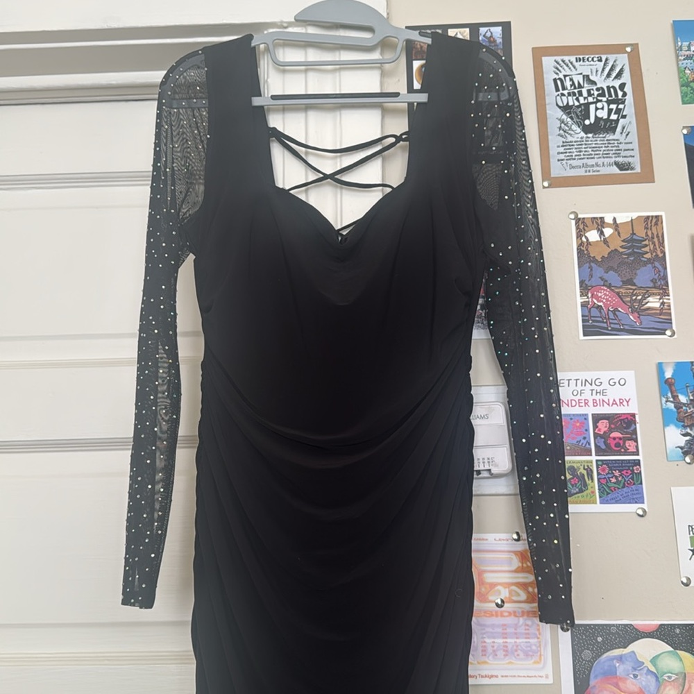 City Studio black floor length gown. Bought at Macey’s. Open mid back detailing.